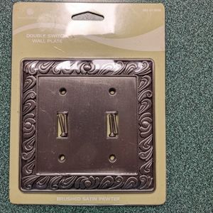 Double switch plate in pewter